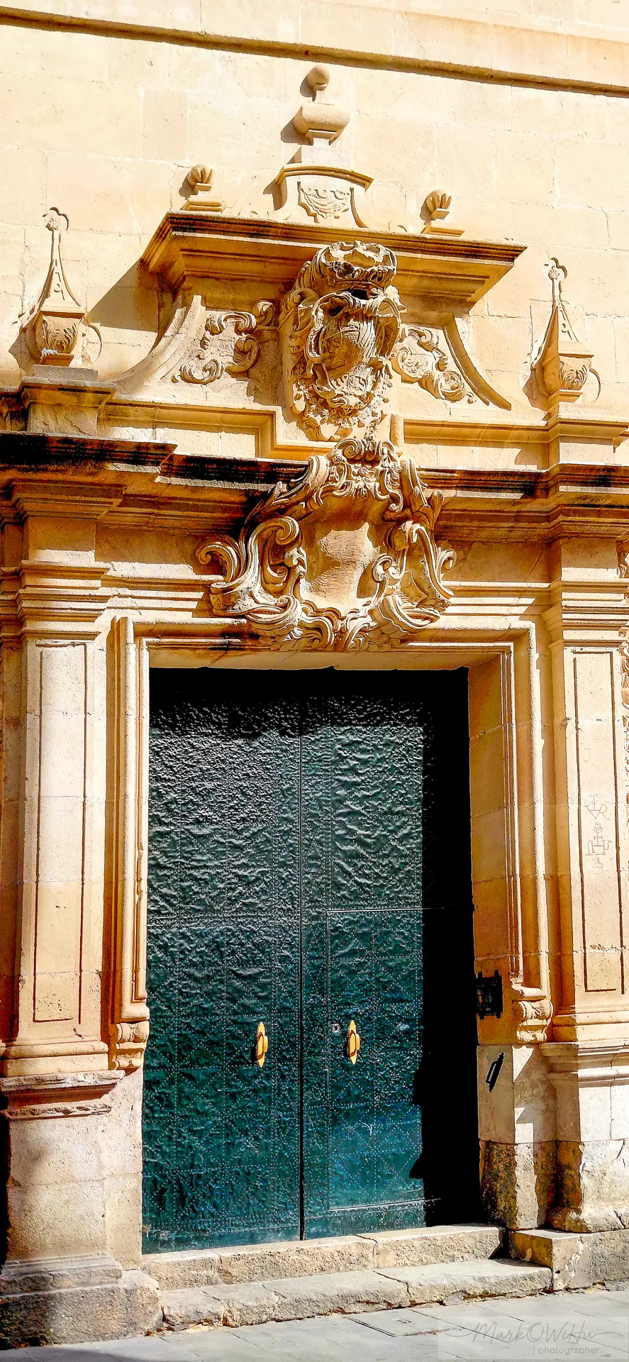 Golden stone doorway and dark green wooden door | Foto Walk 2026 Alicante | MarkOWiHu Photographer