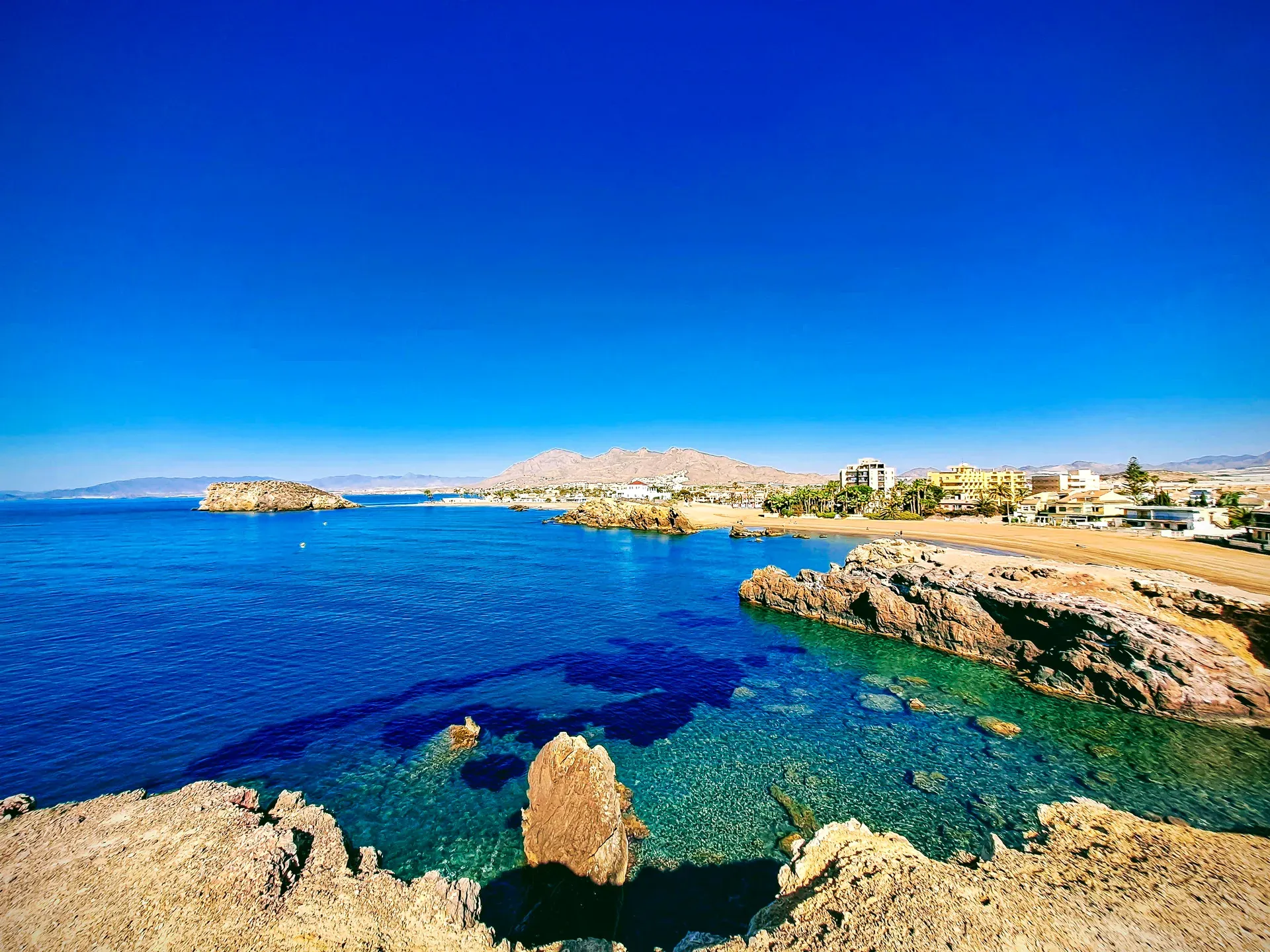 Rugged rocky coastline and vibrant turquoise Mediterranean water | Seascape | Alicante province | MarkOWiHu Photographer Fotógrafo • markowihu.es